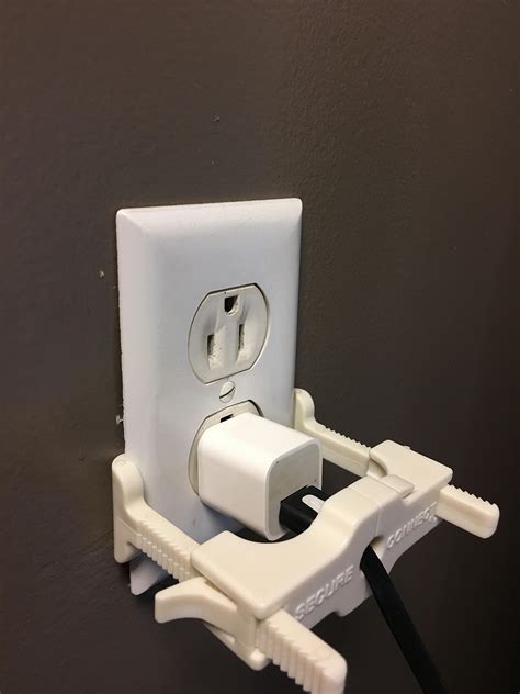 secure electrical plug to outlet